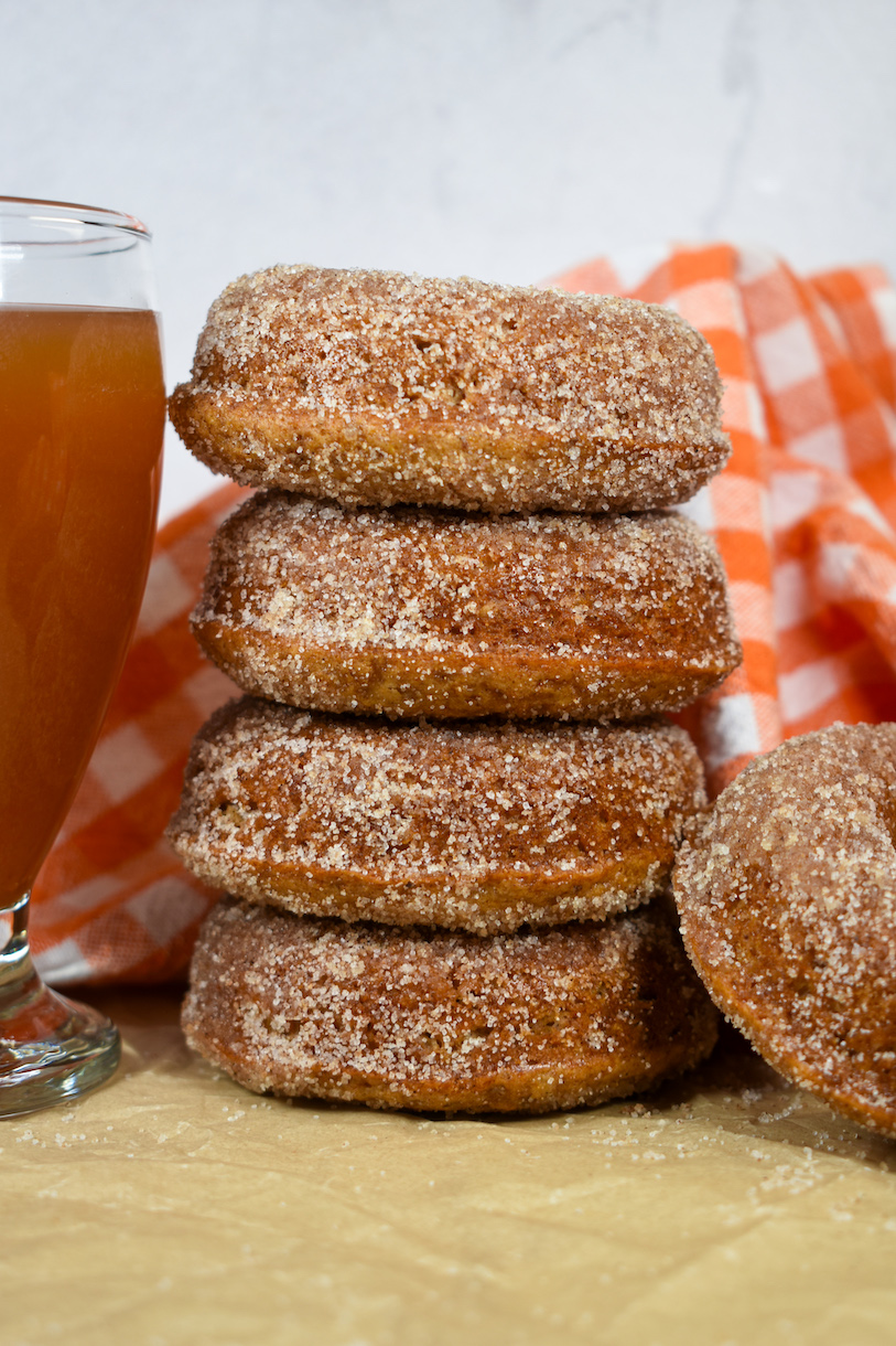 a stack of apple cider donuts