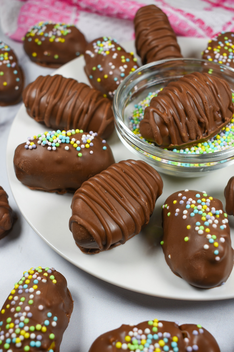 chocolate covered buttercream easter eggs on a white plate
