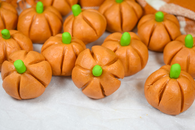peanut butter pumpkins on a white surface