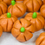 peanut butter pumpkins on a white surface
