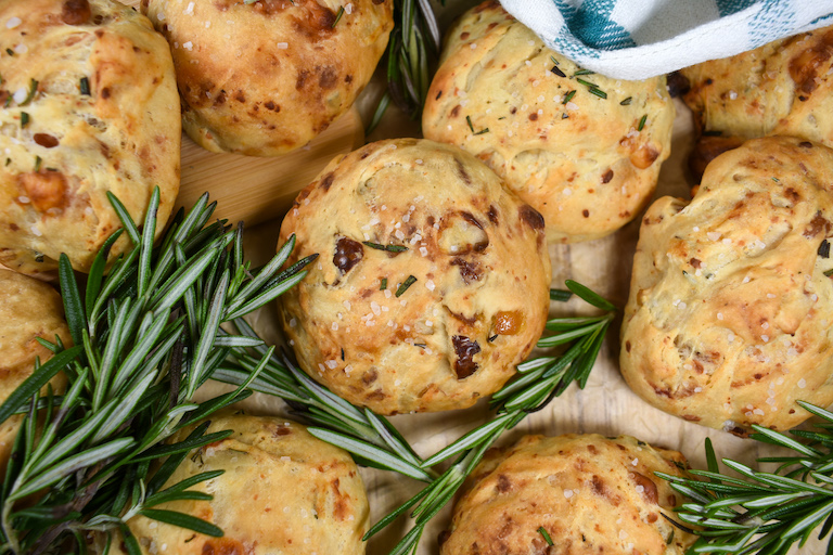 dinner rolls with sprigs of rosemary