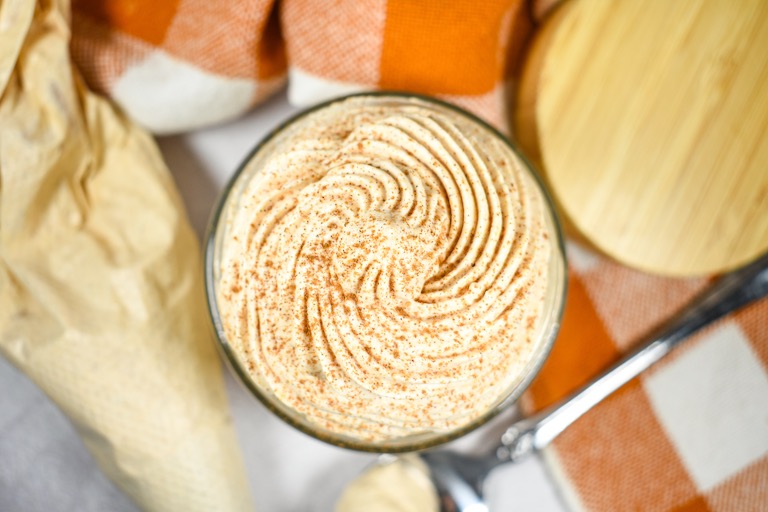 looking down at a jar of pumpkin whipped cream