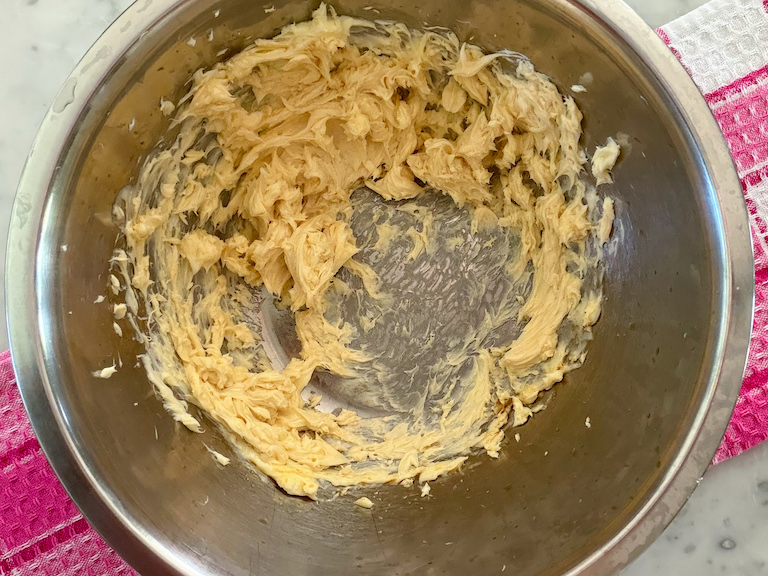 whipped butter in a metal bowl