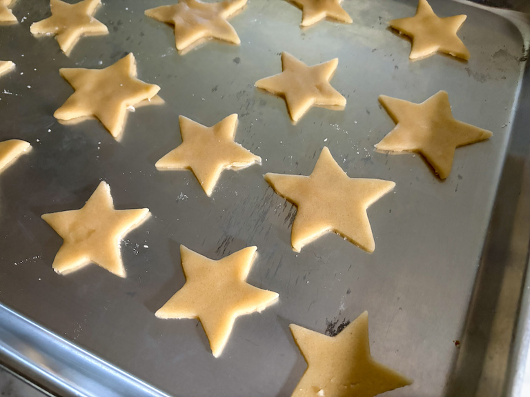 sand tart stars arranged on a tray