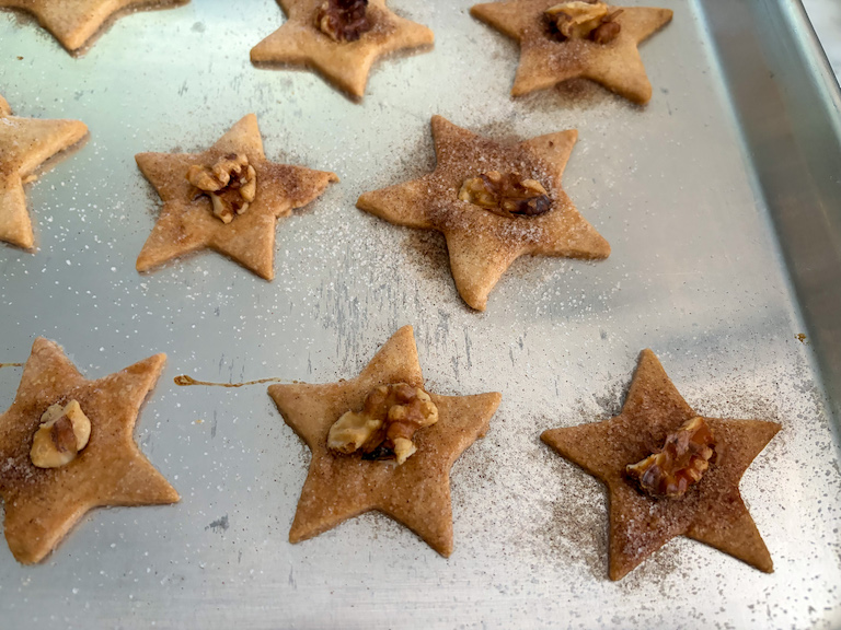 star shaped PA Dutch sand tarts on a tray after baking