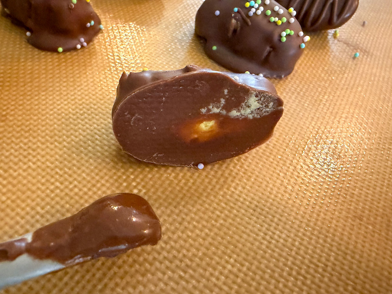 the bottom of a buttercream easter egg