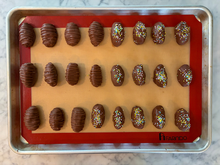 buttercream easter eggs on a tray