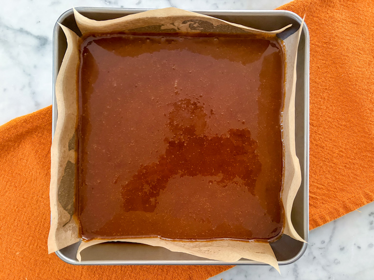 a pan of pumpkin spice caramels