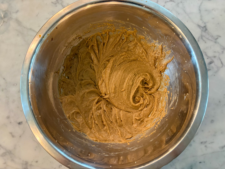 butter and sugars whipped in a mixing bowl