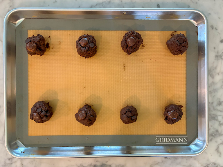 balls of cookie dough on a tray