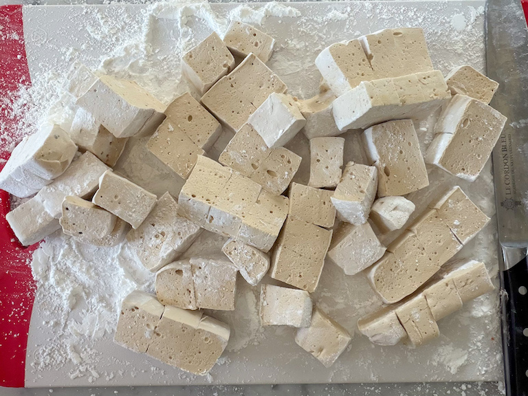coffee marshmallowed on a sugared chopping board