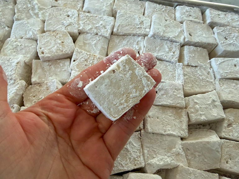 hand holding a coffee marshmallow