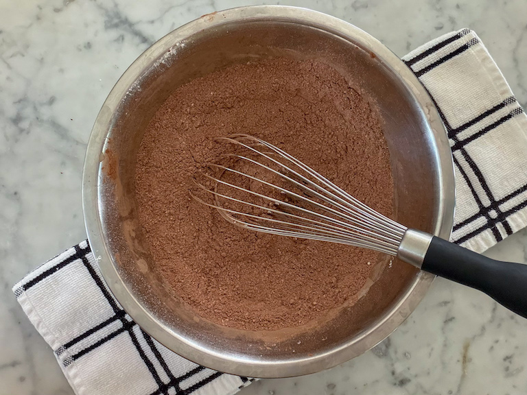 dry ingredients in a bowl with a whisk
