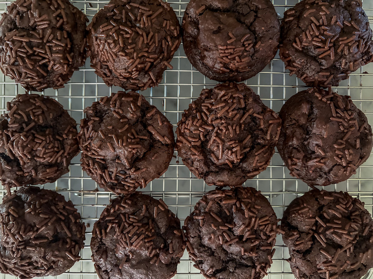 chocolate cookies cooling on a tray