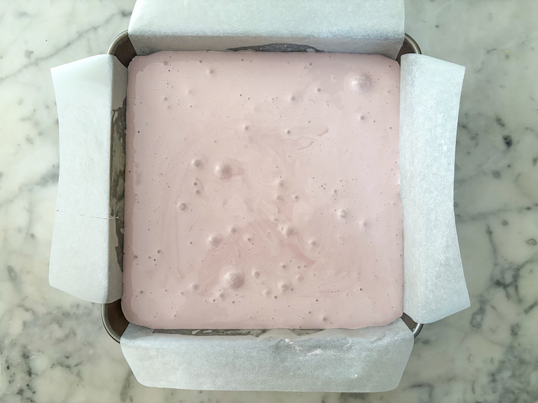marshmallow in a parchment lined tin