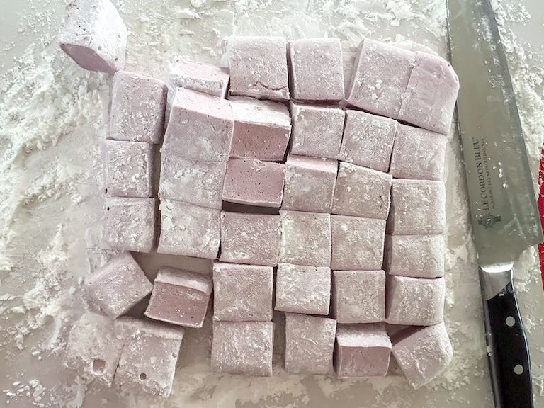 knife slicing marshmallows into squares