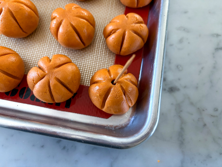 making a hole in the top of a peanut butter pumpkin