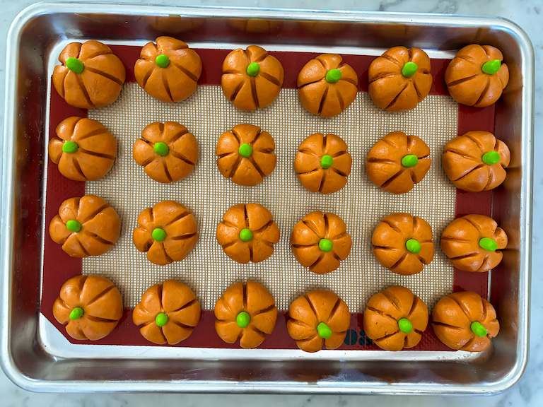 peanut butter pumpkins arranged on a metal tray