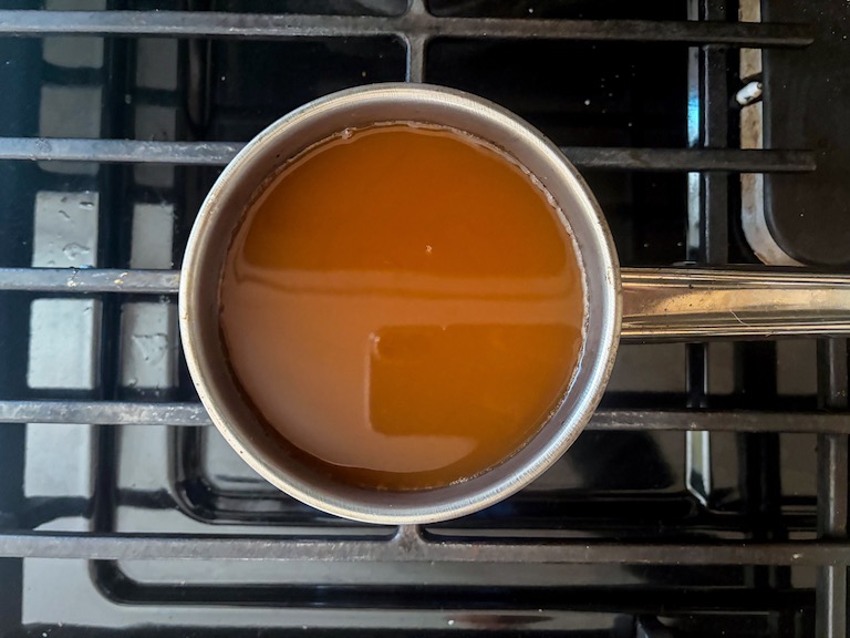 apple cider in a small pan