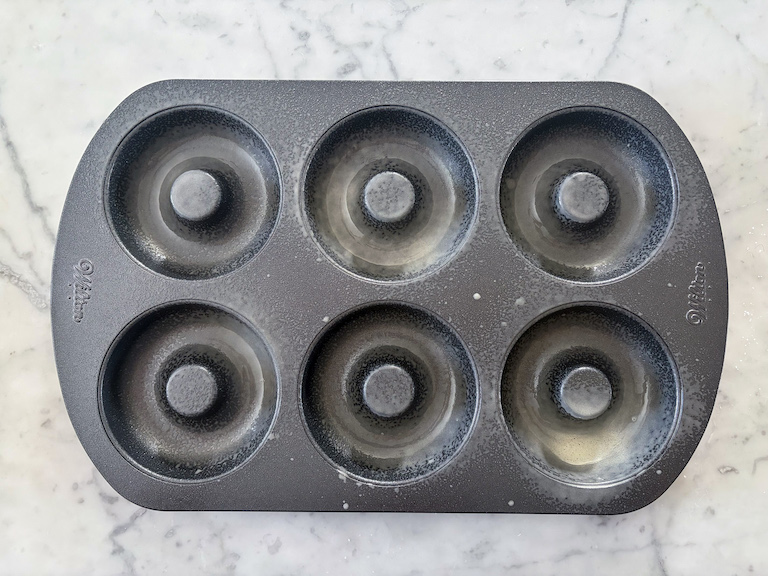 a metal donut tin