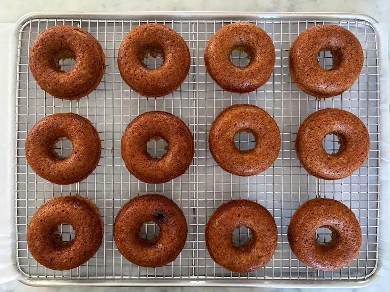 donuts arranged on a wire rack