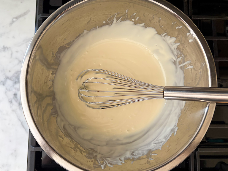 a bowl of melted white chocolate