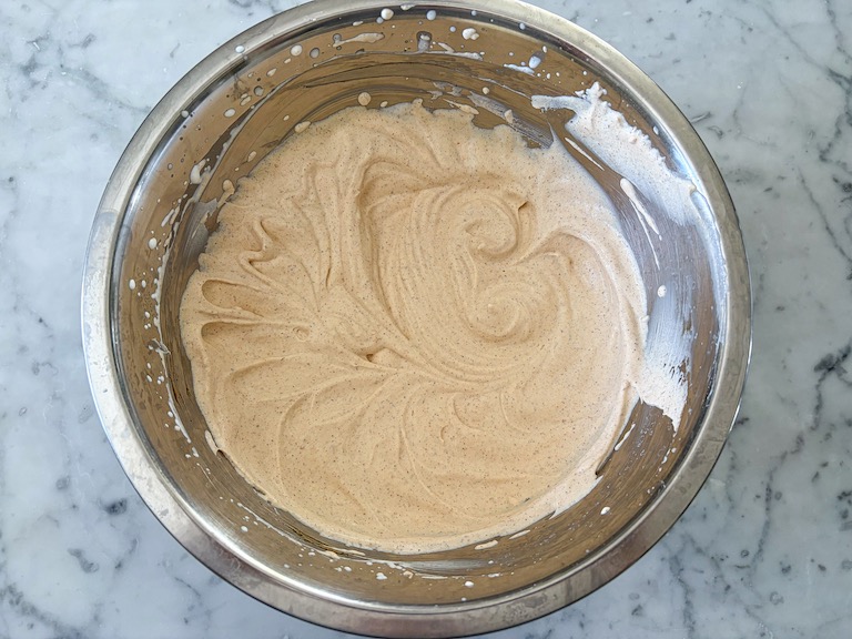 pumpkin pie whipped cream in a metal bowl