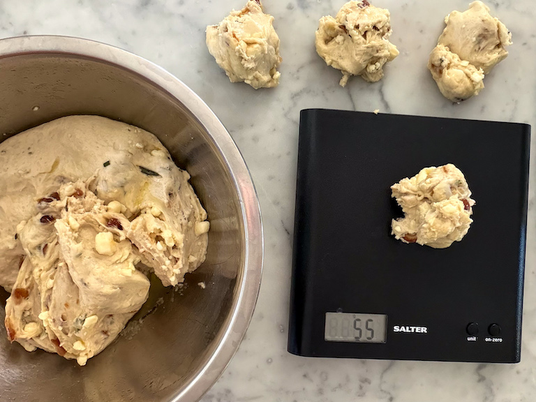 scaling bread dough into roll portions